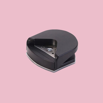 Compact Plastic and Metal Corner Cutter in Black, Pink, and Blue